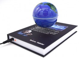 Левитирующий глобус на книге